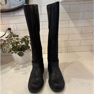 Tall black brushed leather boots